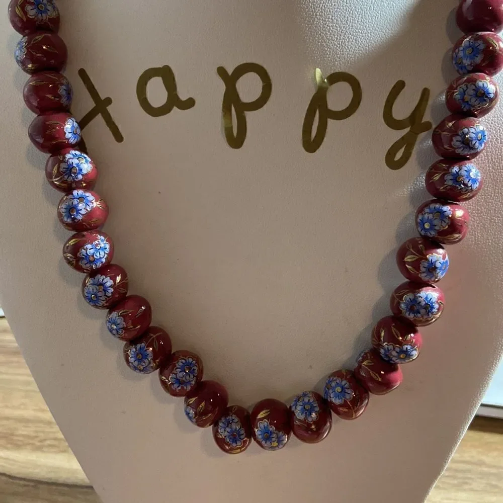 Bedded necklace painted flowers burgundy color with blue details
